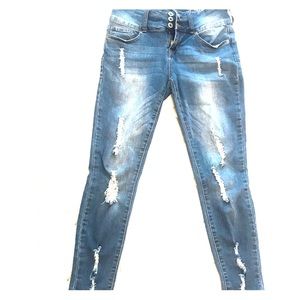 High rise curvy ripped jeans